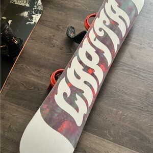 Capita Snowboard with orange Bindings size 143 cm